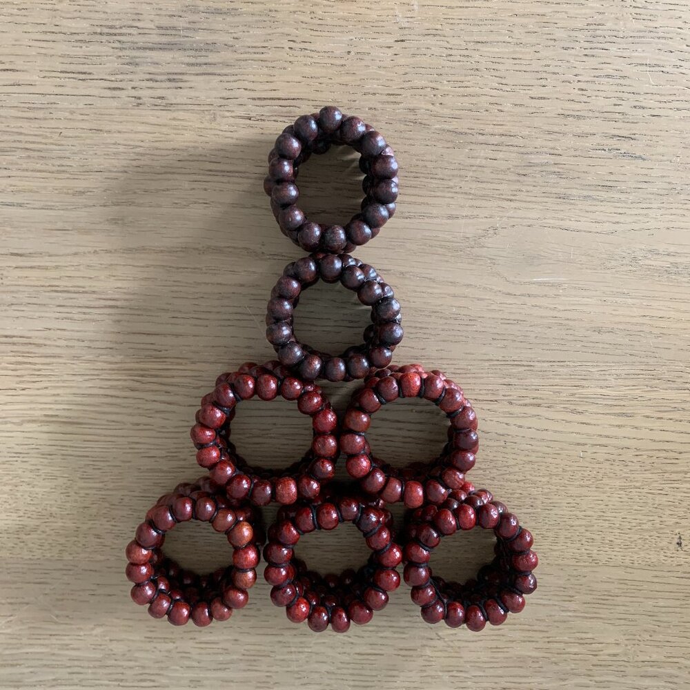 Set of 7 Crate and Barrel Mahogany Red Wooden Bead Napkin Rings Used 2"